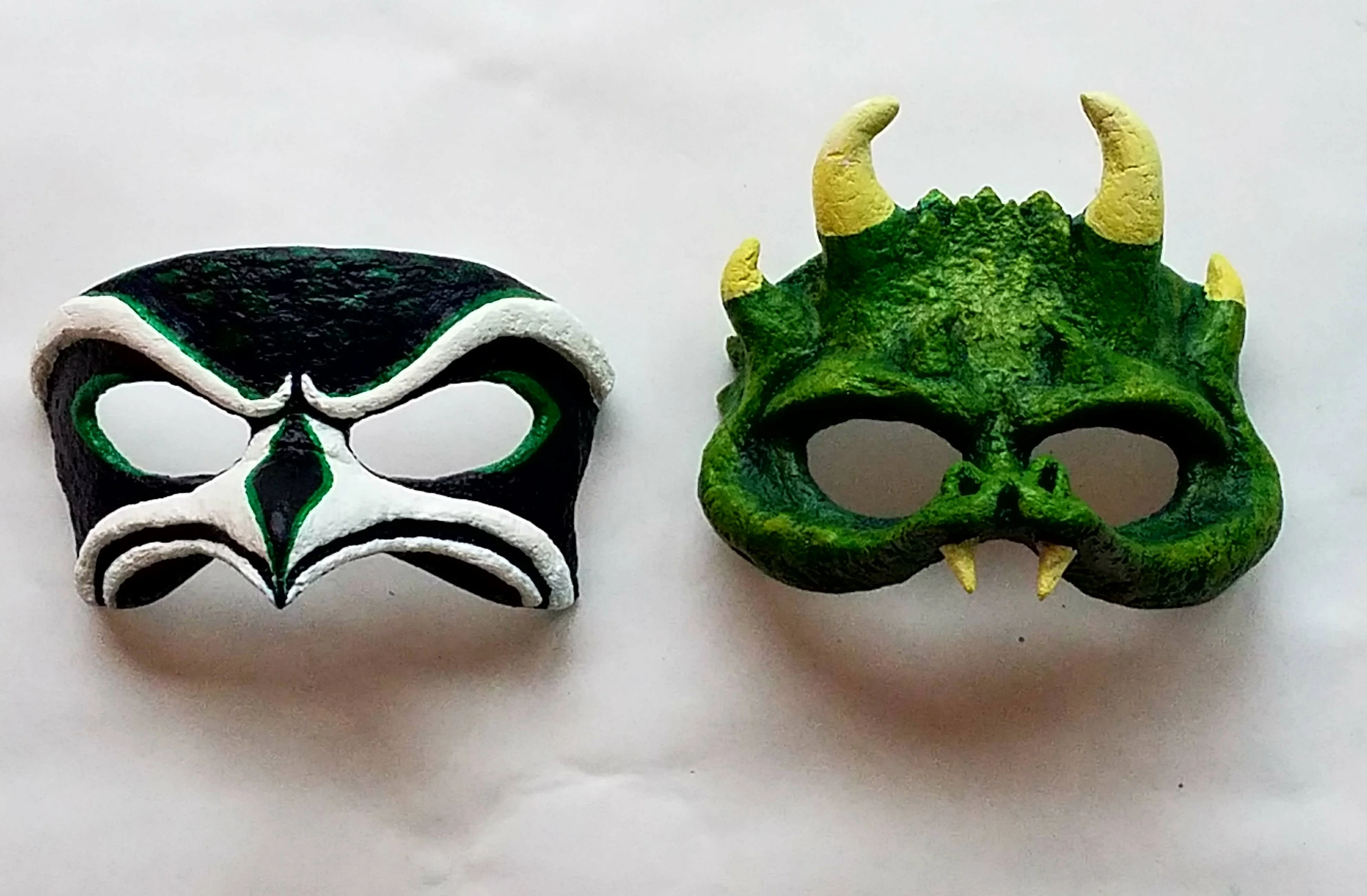 Collection of handmade paper craft masks